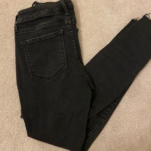 Black distressed skinny jeans